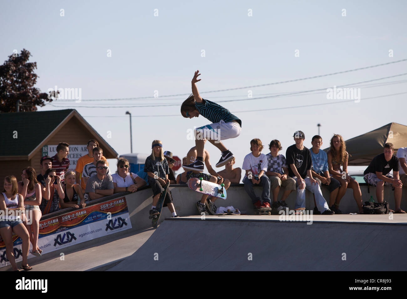 Skateboarder performing a kickflip at the AGA skate competition in Ludington, Michigan Stock Photo