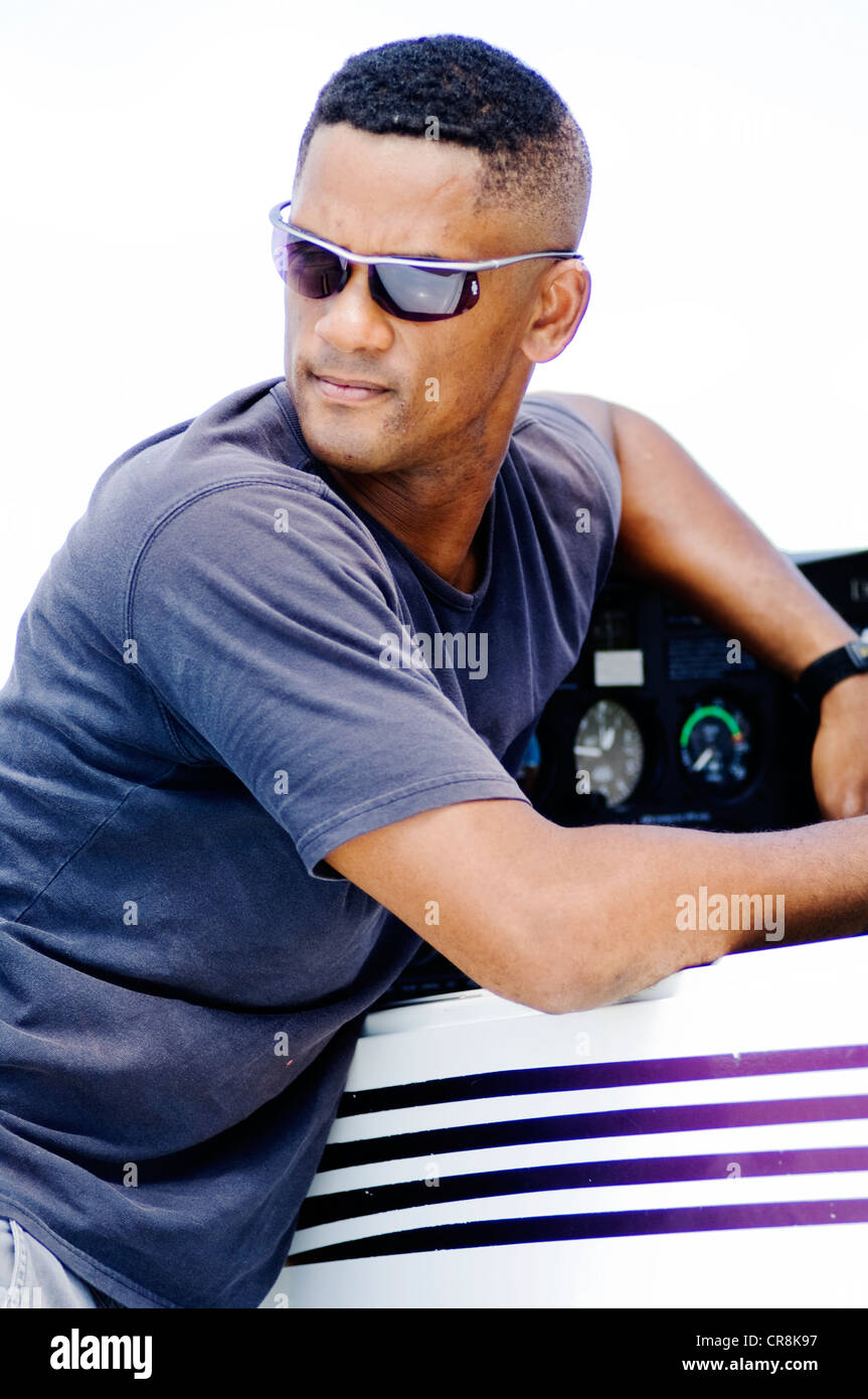 African american pilot checking hi-res stock photography and images - Alamy
