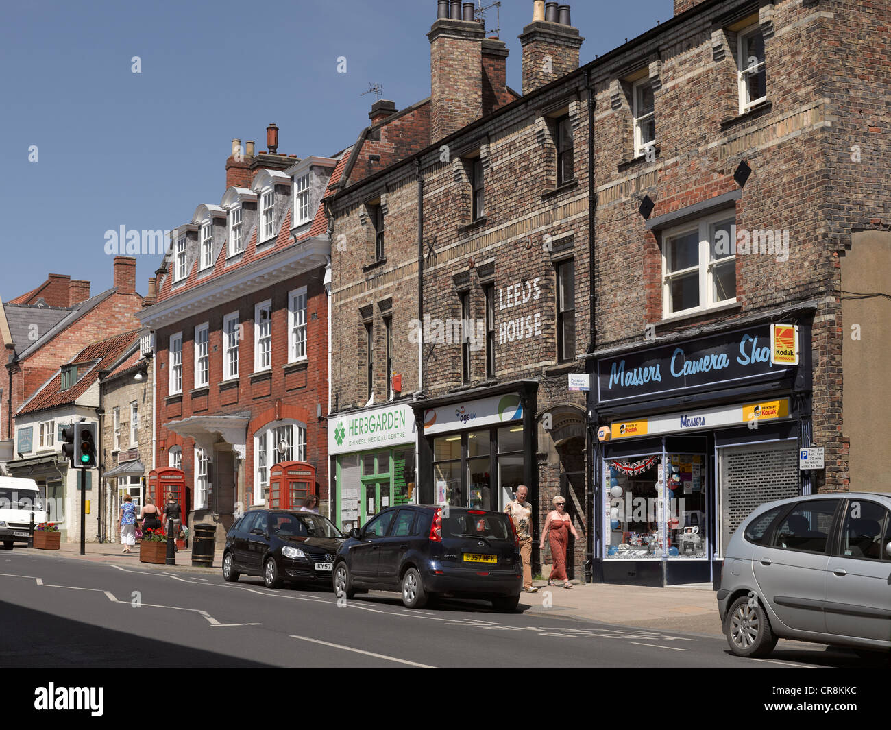 Shops stores business in the town centre Wheelgate Malton North Yorkshire England UK United Kingdom GB Great Britain Stock Photo