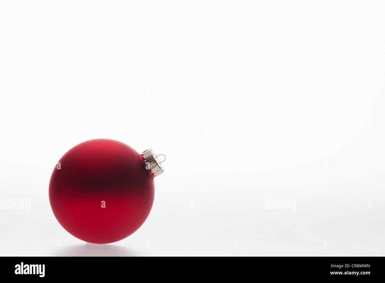 Single red bauble Stock Photo