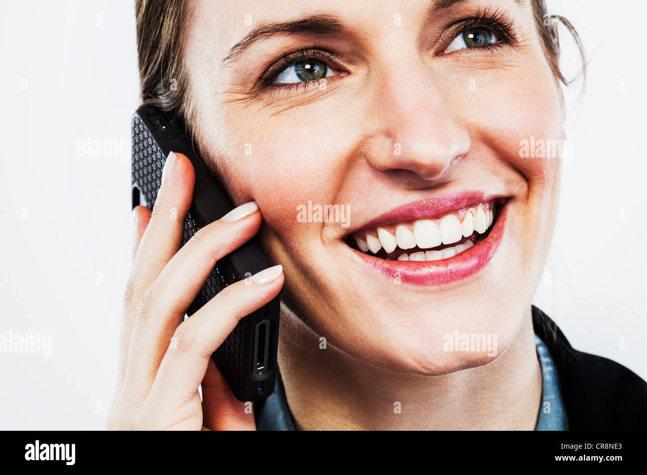 Young woman on smartphone Stock Photo