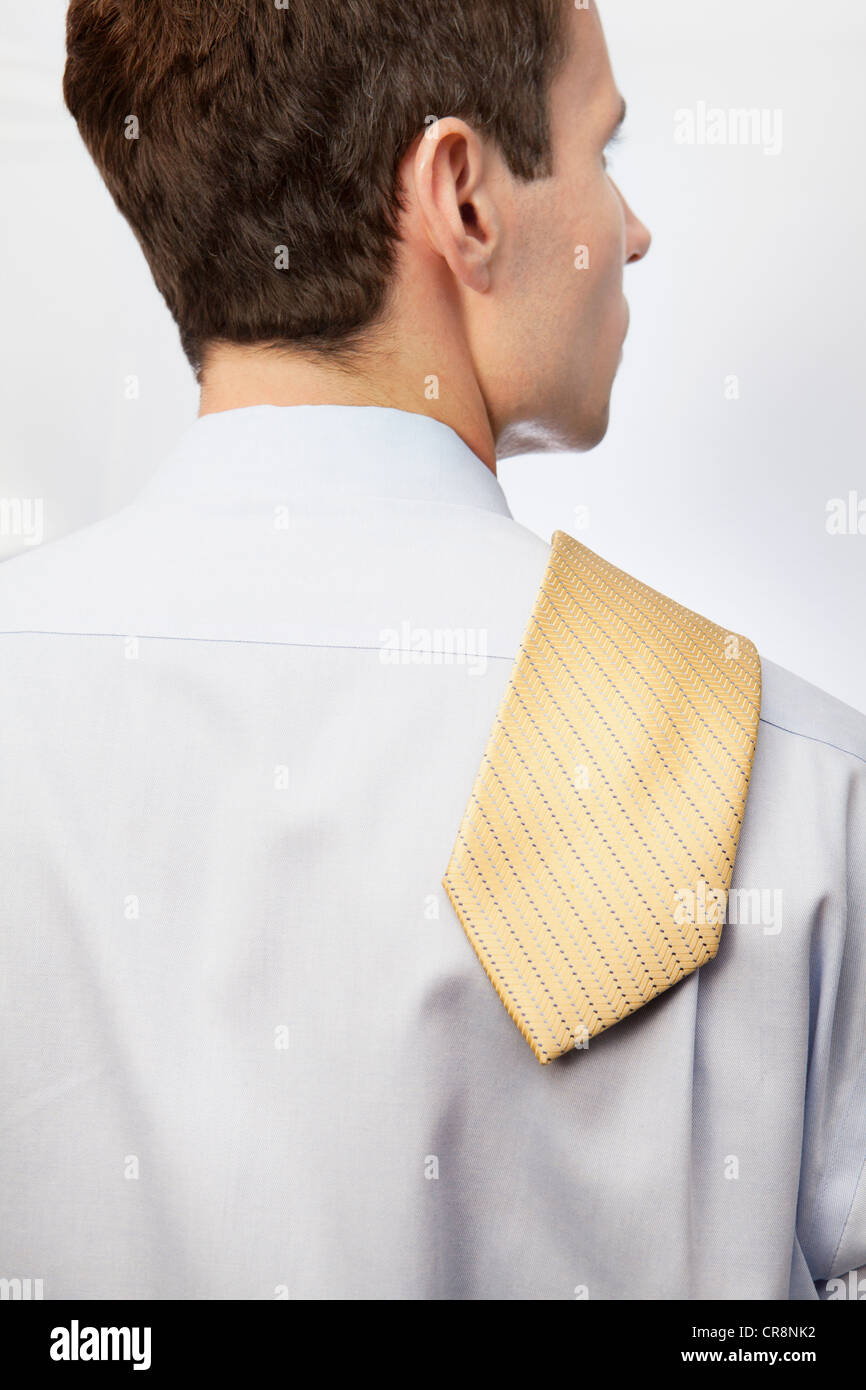 Young man with tie over shoulder Stock Photo