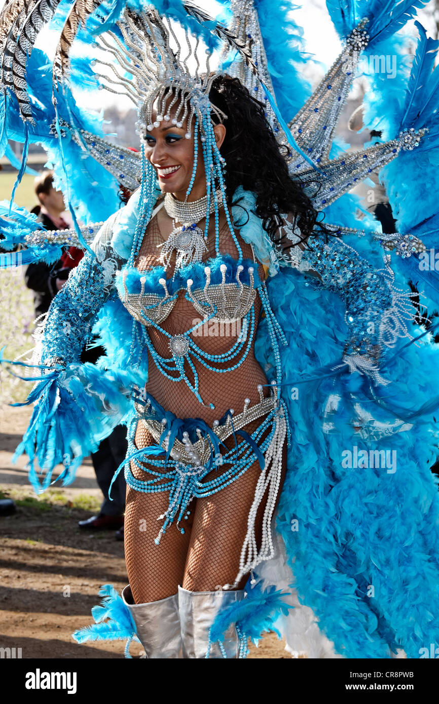 Racy Samba dancer wearing a sophisticated feather costume, Rosenmontagszug Carnival Parade 2011, Duesseldorf Stock Photo