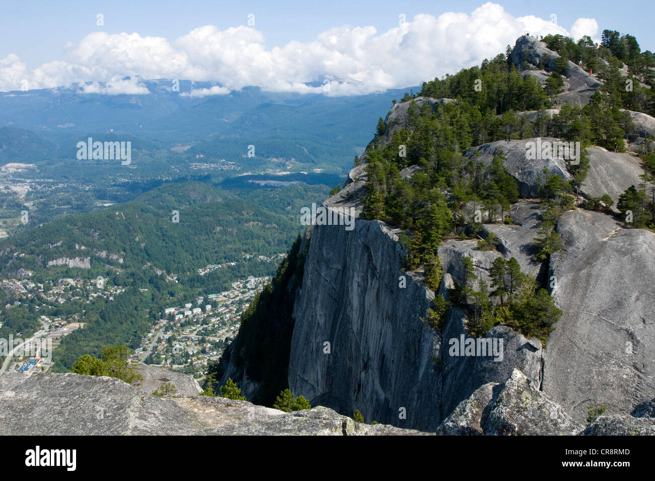 Looking down on the town of Squamish, British Columbia, Canada from on top of the Chief Stock Photo