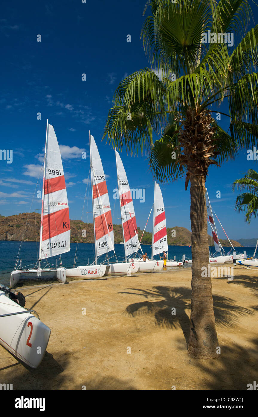 Catamarans on the beach of the D-Hotel Maris in Marmaris, Turkish Aegean Coast, Turkey Stock Photo