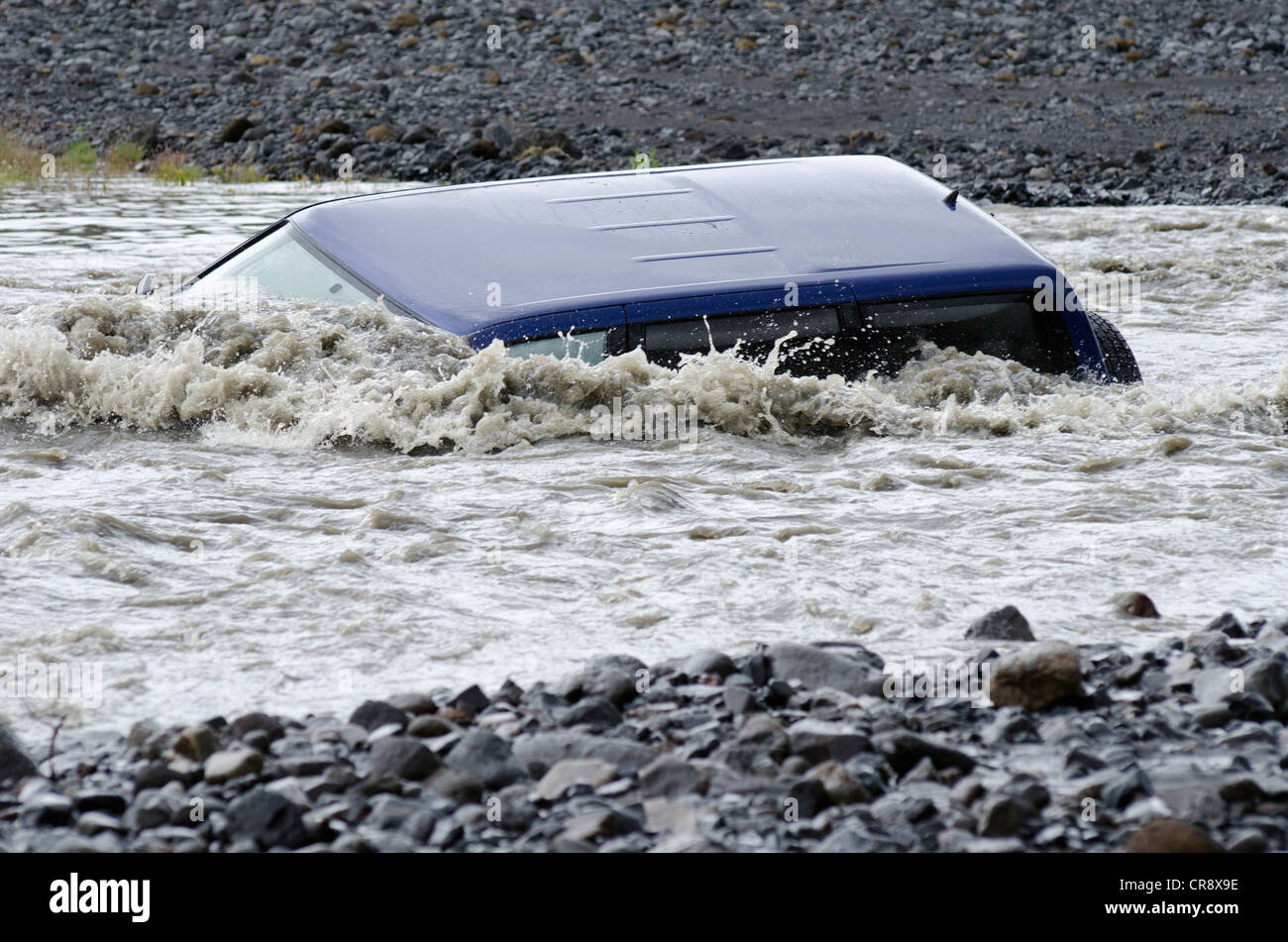 A jeep, sunk in the glacial river of Krossá, Þórsmoerk, Iceland, Europe Stock Photo