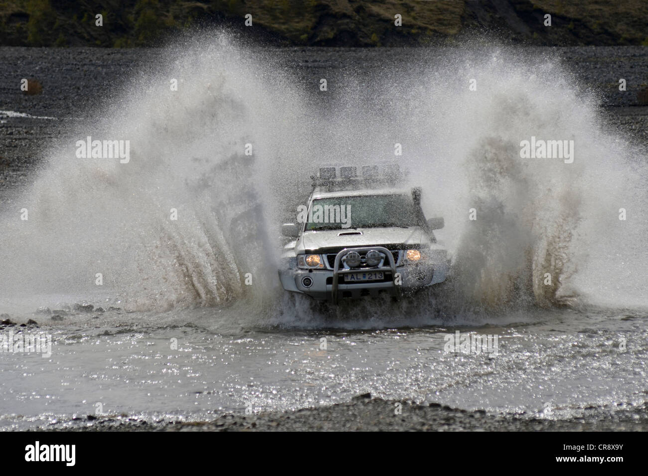 Super jeep driving through a tributary of the Krossá River, Þórsmoerk, Iceland, Europe Stock Photo