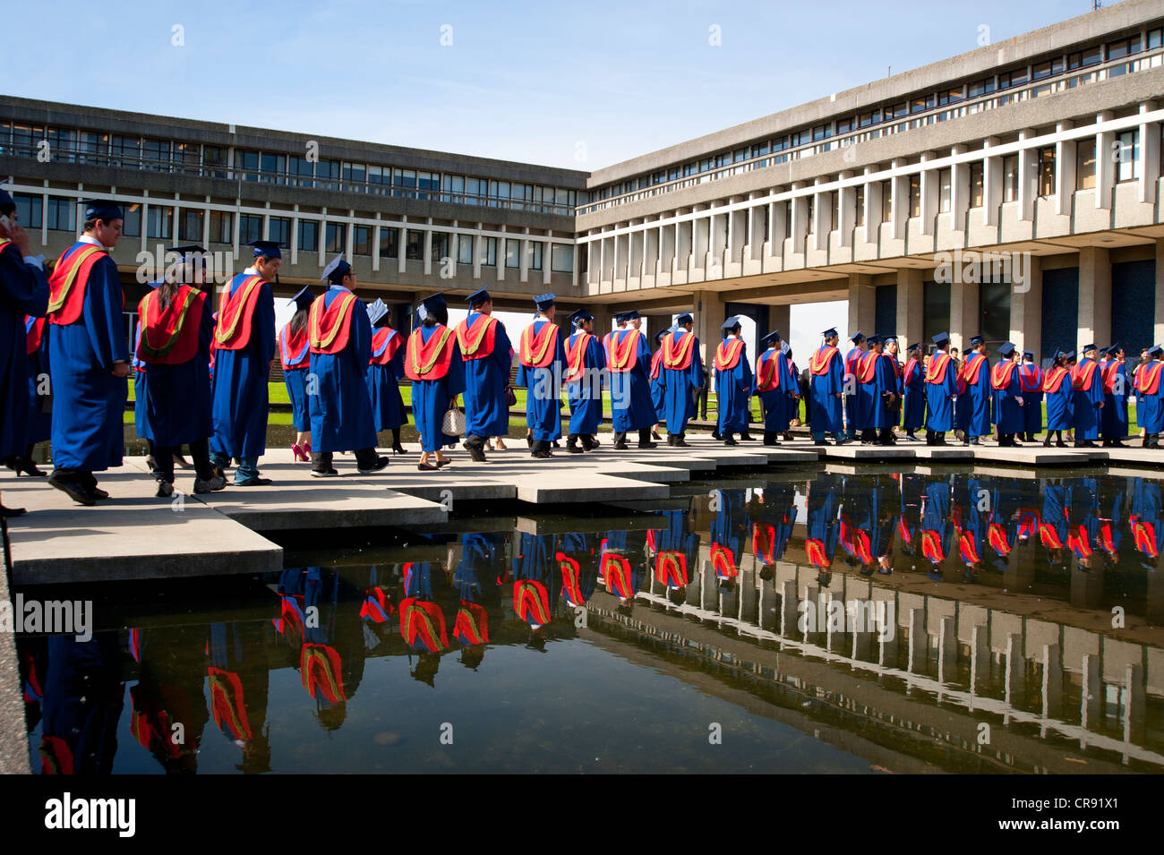 Row of graduating students with caps and gowns at convocation ceremony at Simon Fraser University, Burnaby, British Columbia, Stock Photo