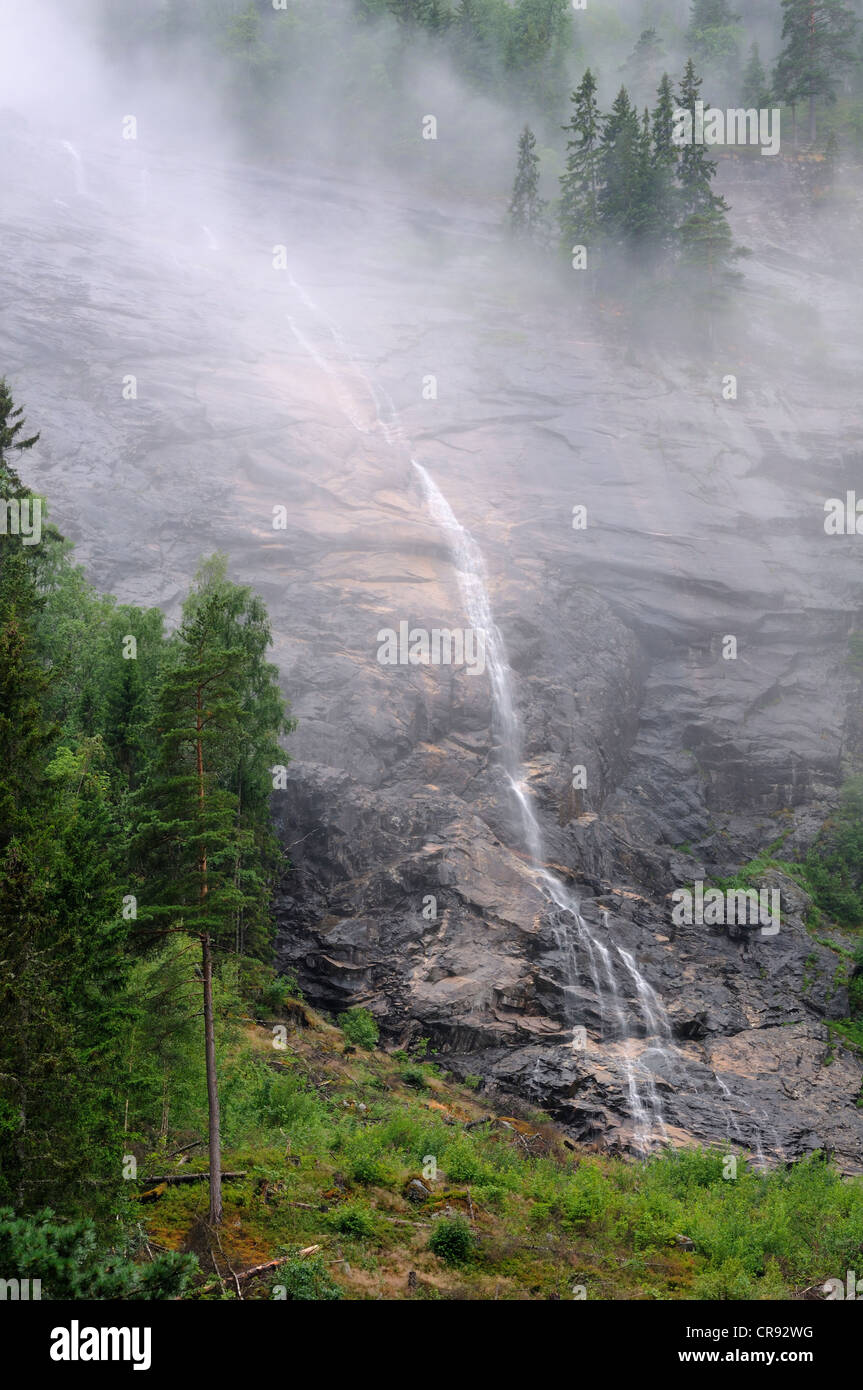 Waterfall in rain, E9 Highway near Evje, Norway, Europe Stock Photo