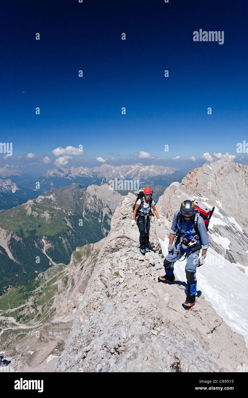 Mountain Climbers Ascending Towards Marmolada Mountain On The Westgrat 