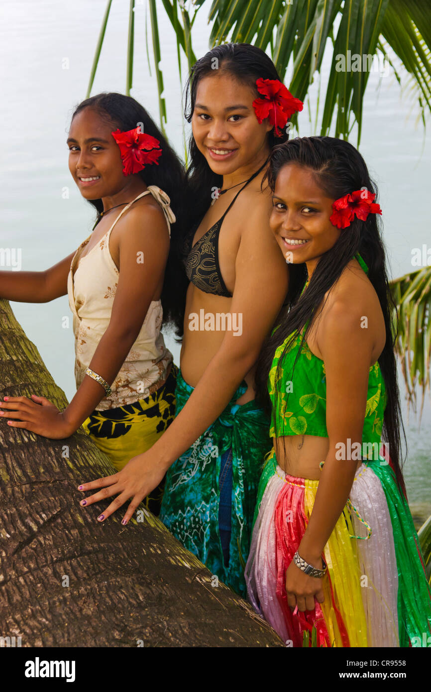 Girl in traditional dress with palm tree, Palau Stock Photo