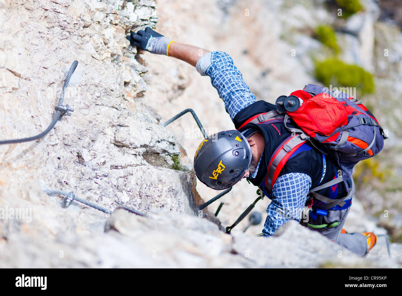 Climbers on the Stevia fixed rope route, Langental valley, Val Gardena valley, Dolomites, province of Bolzano-Bozen, Italy Stock Photo