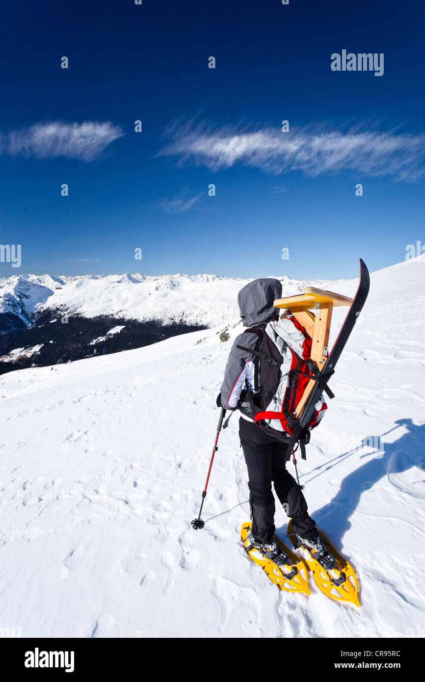 Snowshoeing uphill to the Pfattenspitz peak above Durnholz, behind the