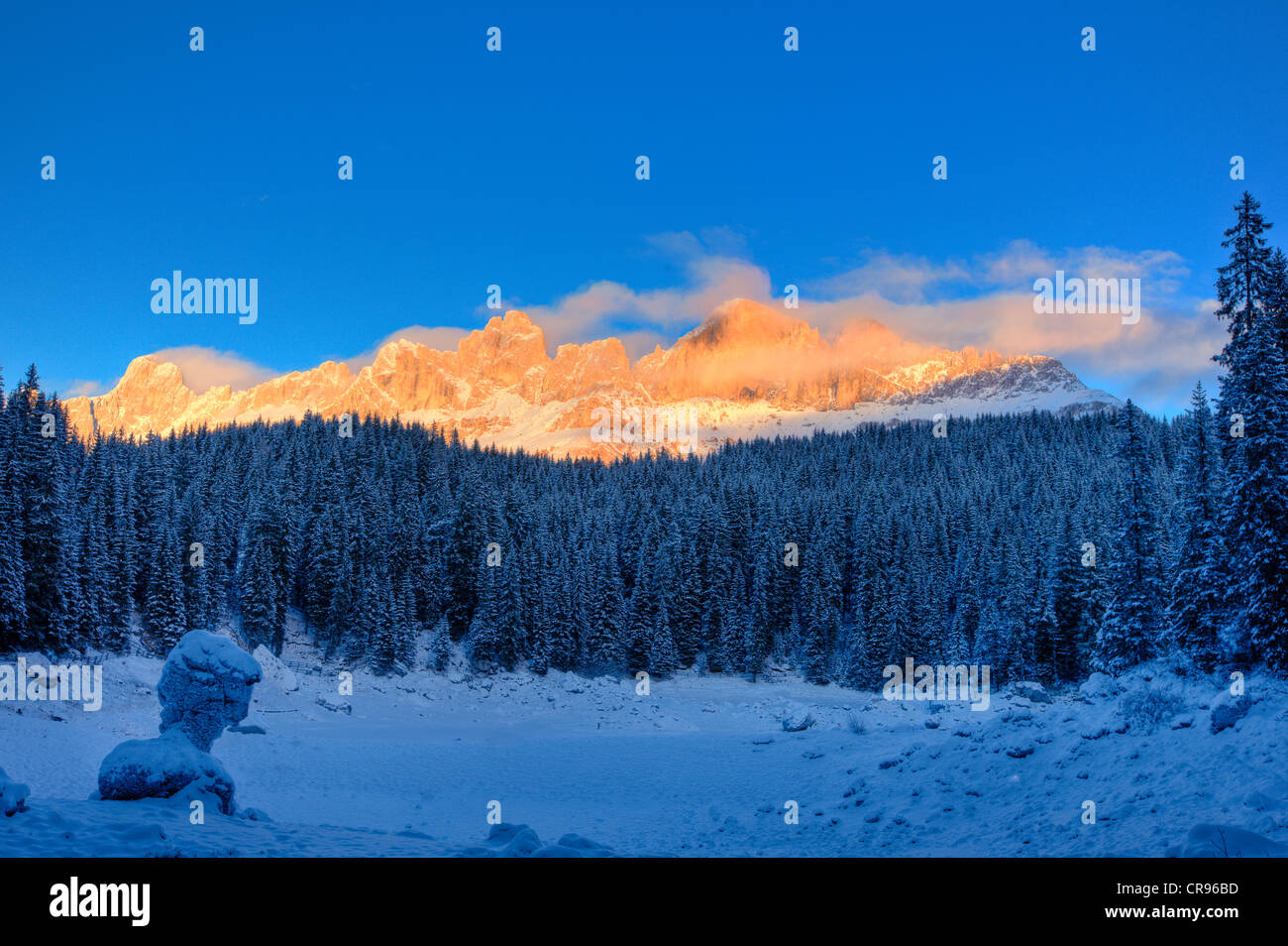 Sunset at the Rose Garden mountain chain in winter, Alto Adige, Italy