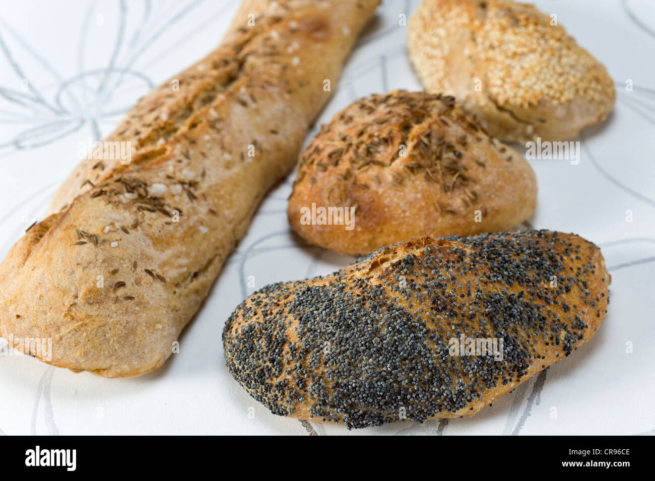 Home-baked bread roll, sesame roll, poppy seed roll, roll with caraway and a Swabian soul, Swabian bread stick Stock Photo