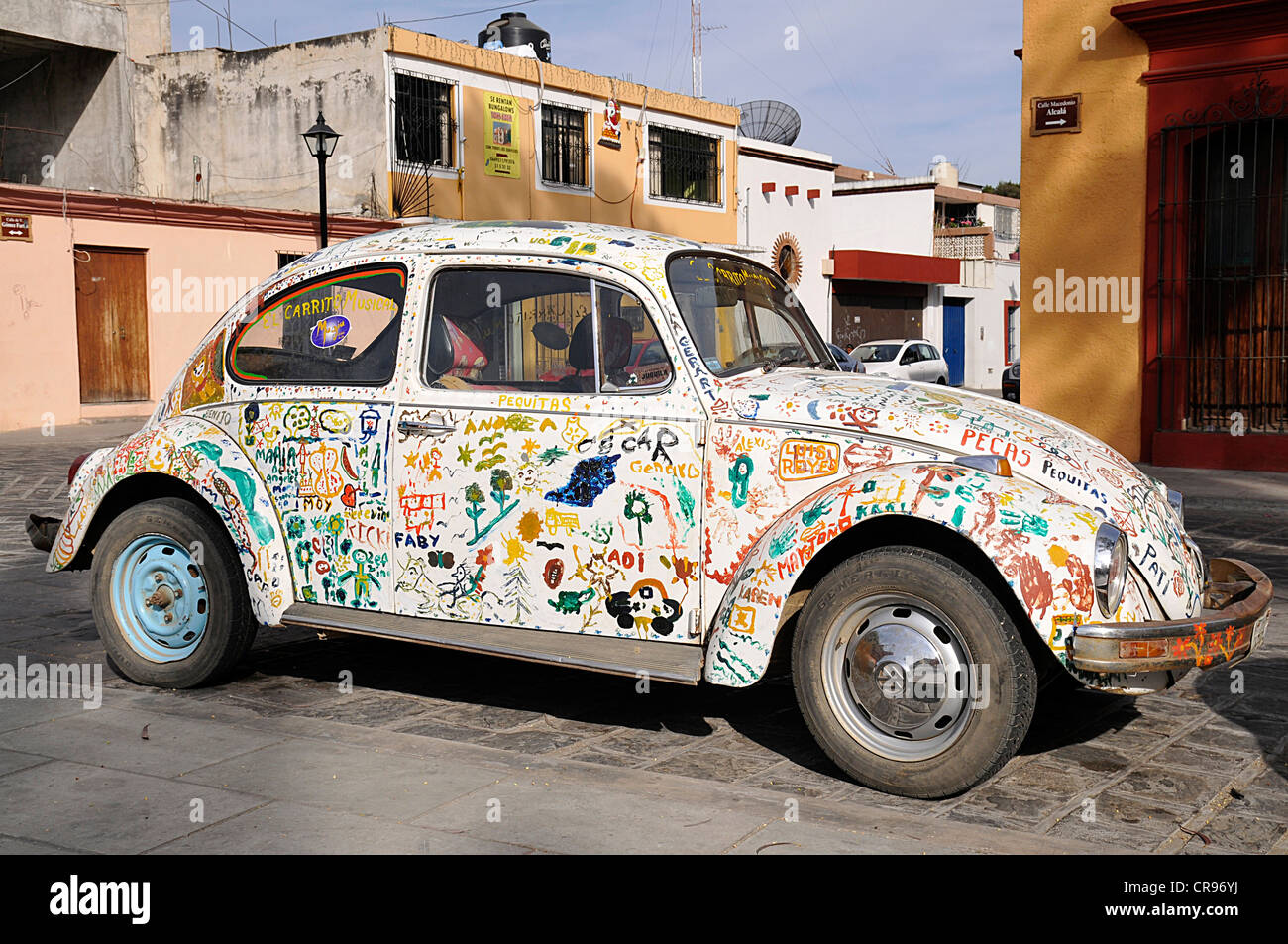 VW beetle decorated with graffiti, Oaxaca de Juárez, Oaxaca, southern Mexico, North America Stock Photo