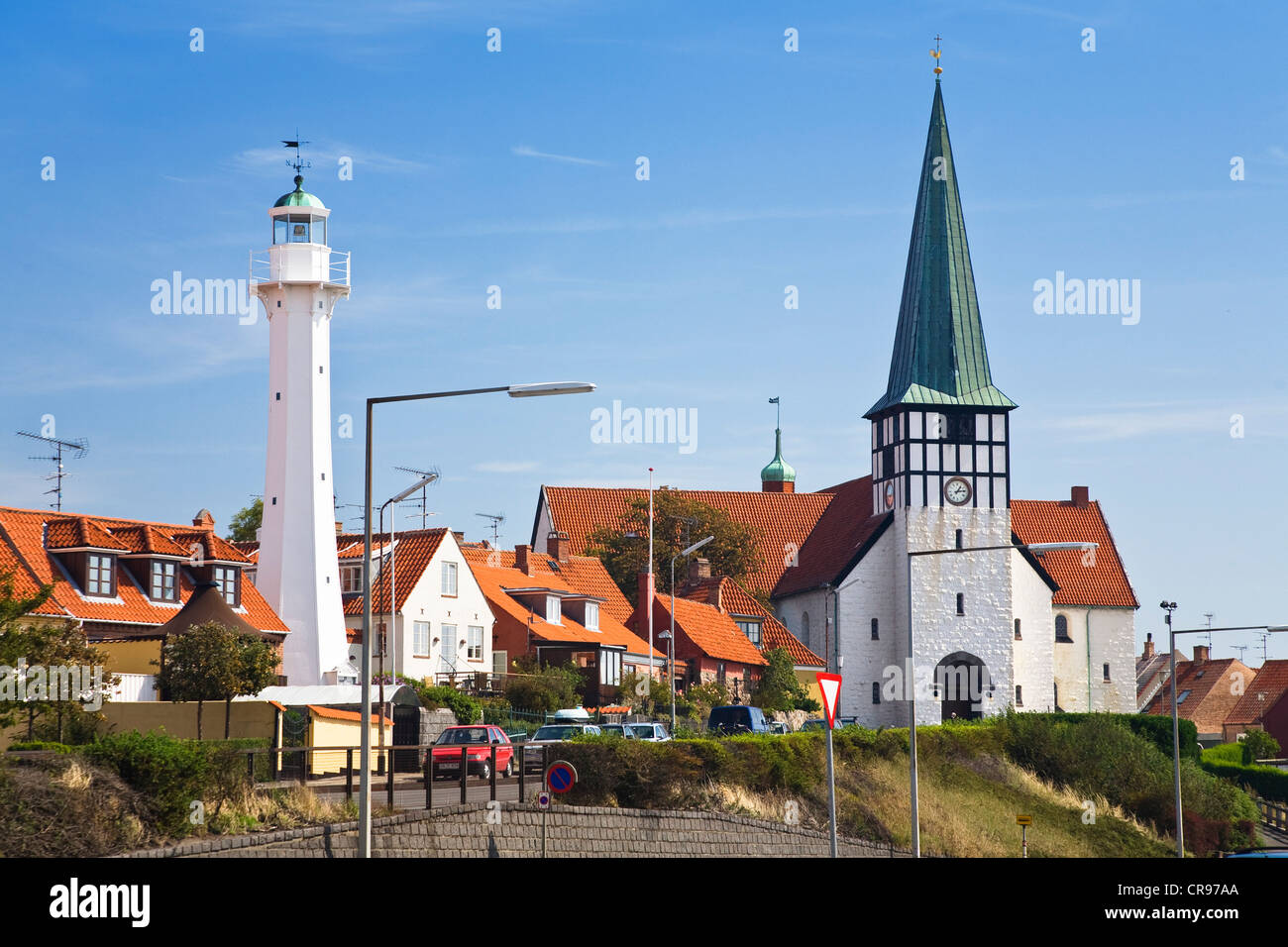 Timber-frame houses, lighthouse and church Skt. Nicolaj Kirke in Rønne, Bornholm, Denmark, Europe Stock Photo