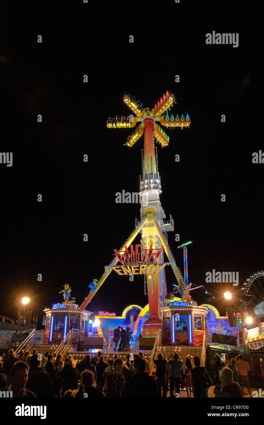 Oktoberfest, Wiesn, amusement rides, giant rotating pendulum at night ...