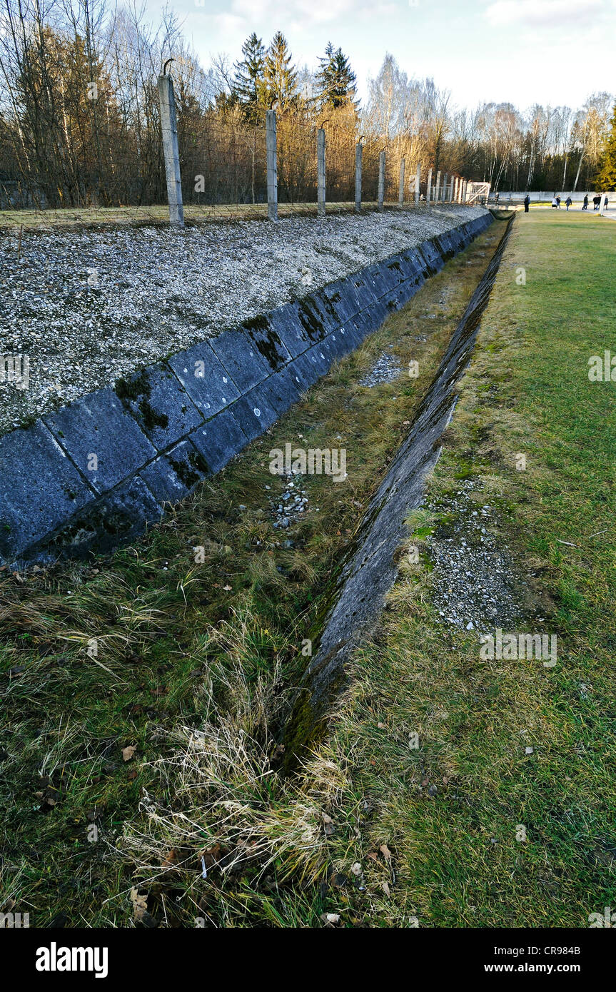 Electrified barbed wire and trenches on the camp grounds, Dachau Concentration Camp, Dachau, near Munich, Bavaria Stock Photo