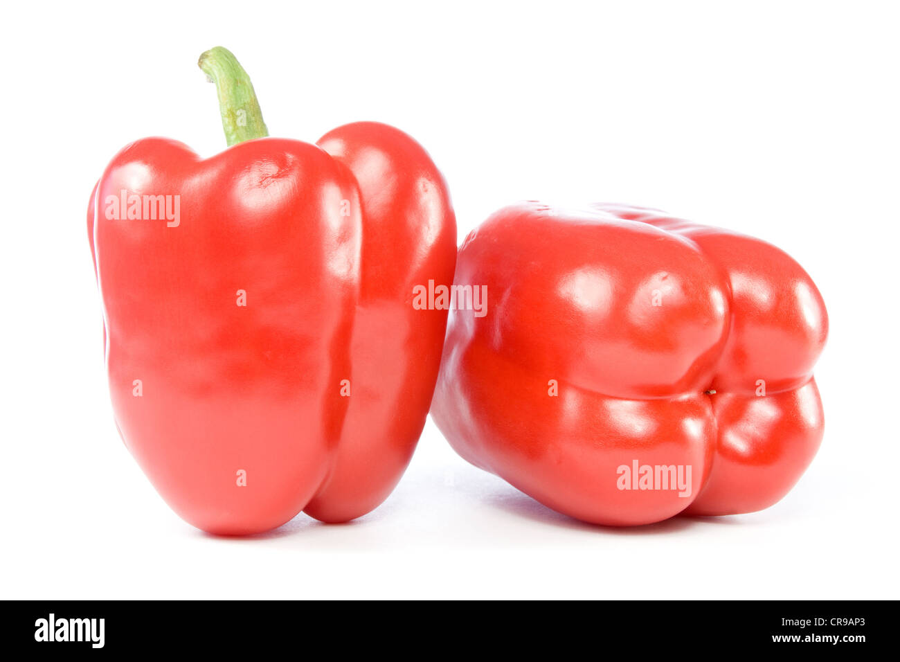 red sweet peppers isolated on white background Stock Photo - Alamy
