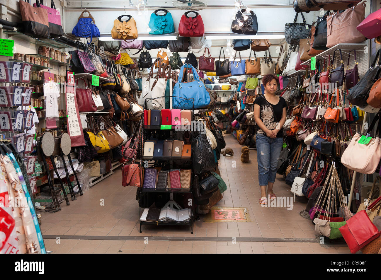 Stall -keeper in Stanley Market, Hong Kong Stock Photo