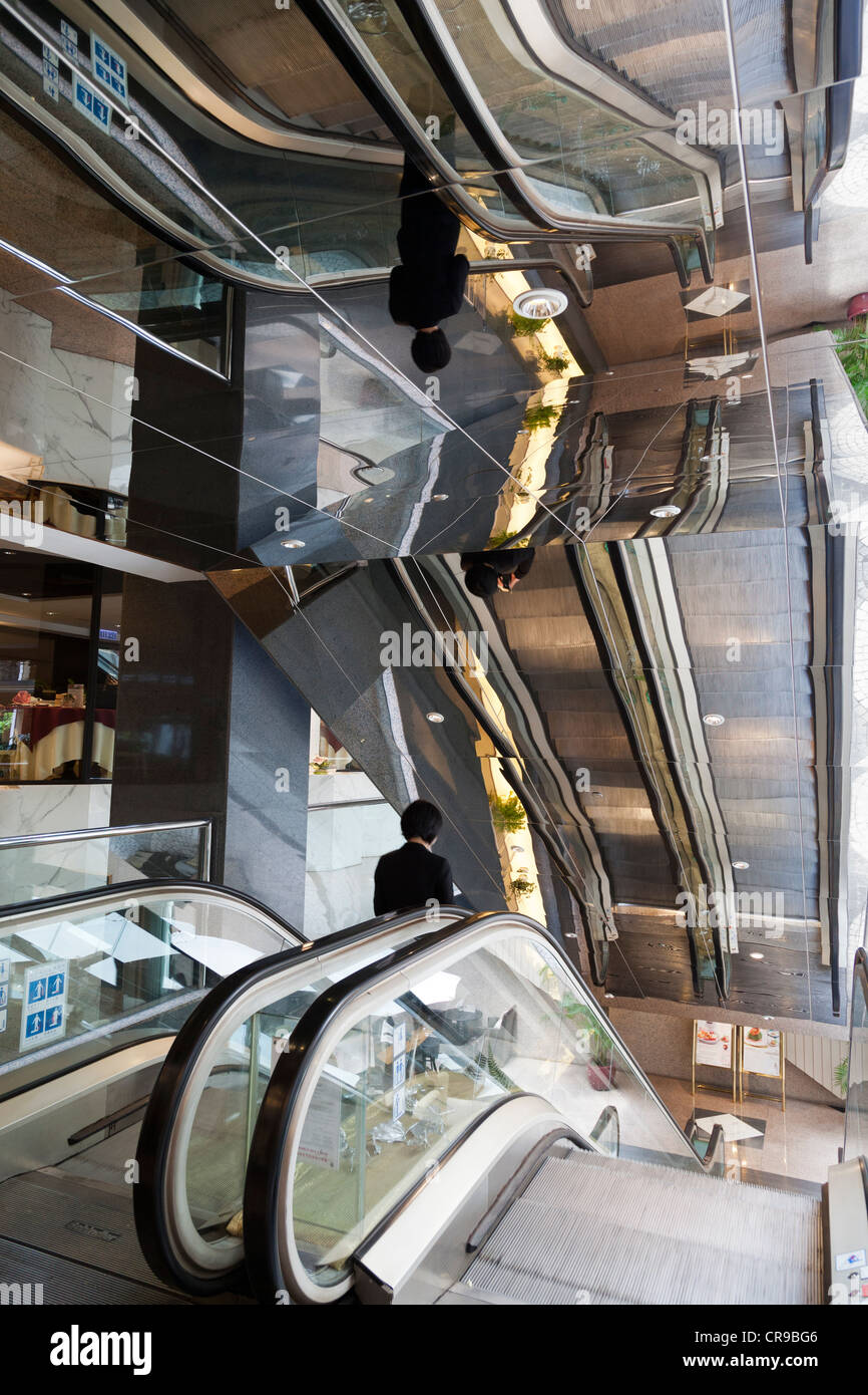 Escalator in City View Hotel, Hong Kong Stock Photo