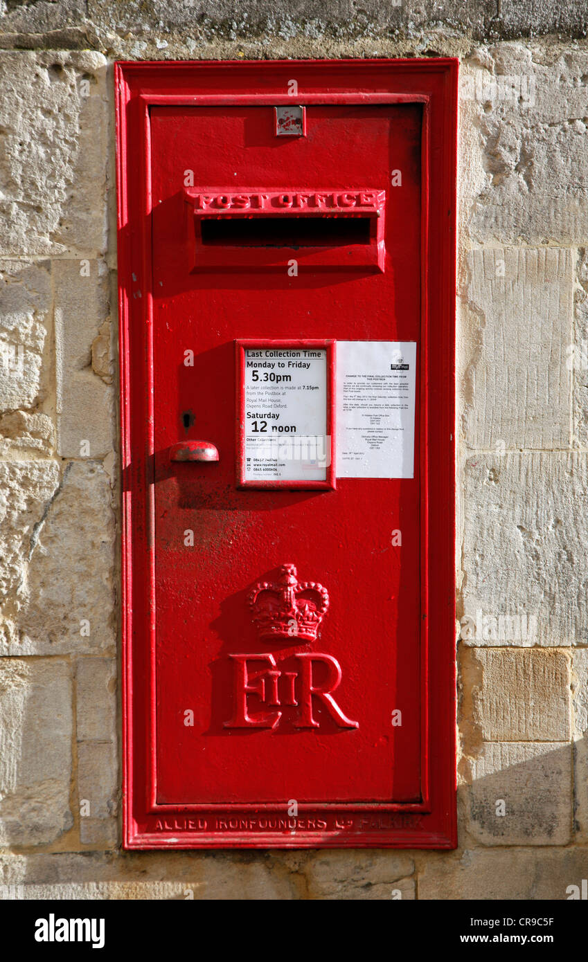 Red, British mailbox, in the old town of Oxford, Oxfordshire, UK, Europe Stock Photo