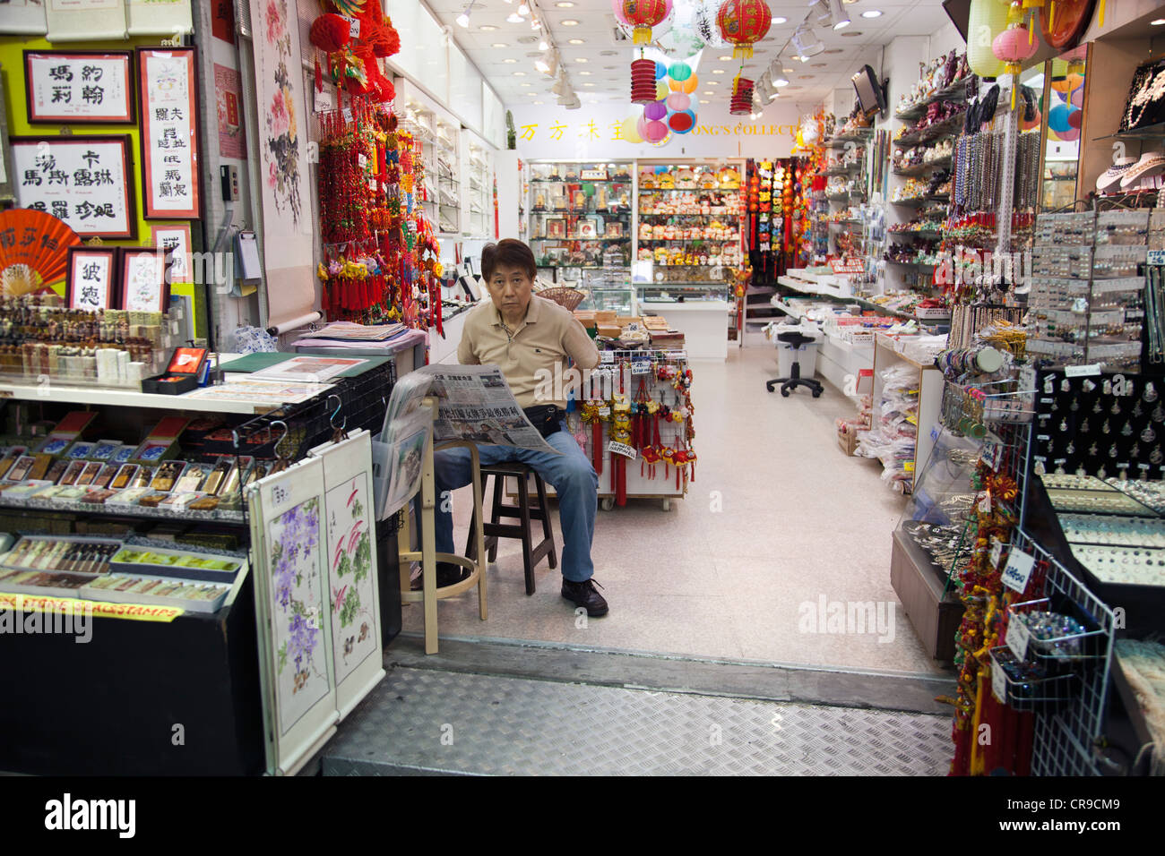 Stall-keeper in Stanley Market, Hong Kong 2 Stock Photo
