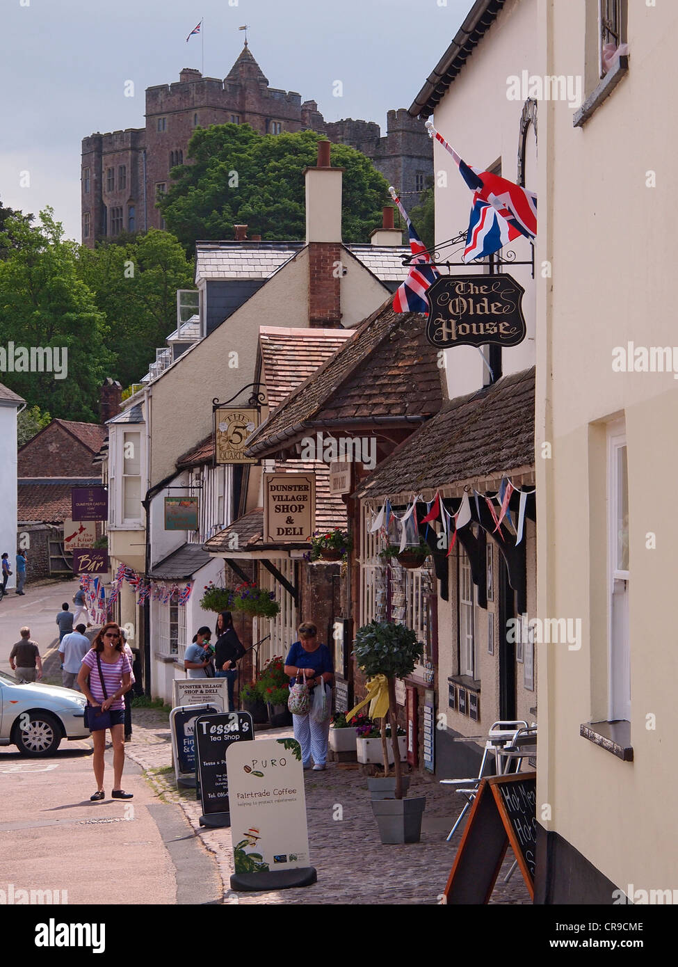 Close up of Dunster high street with Dunster Castle in the back ground