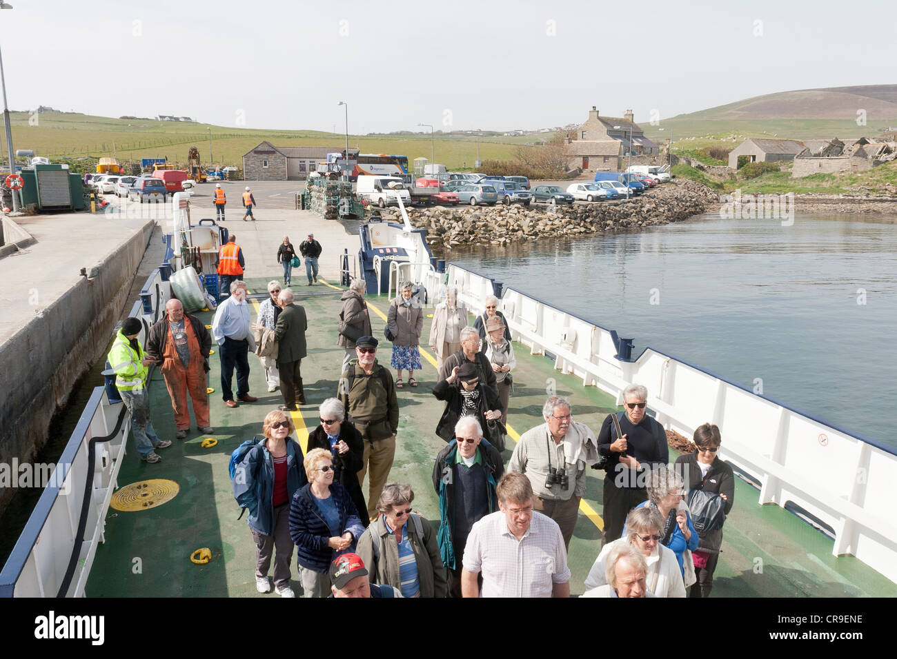 Tingwall Harbour - Orkney Isles, Scotland.  Foot passengers boarding the ferry Stock Photo