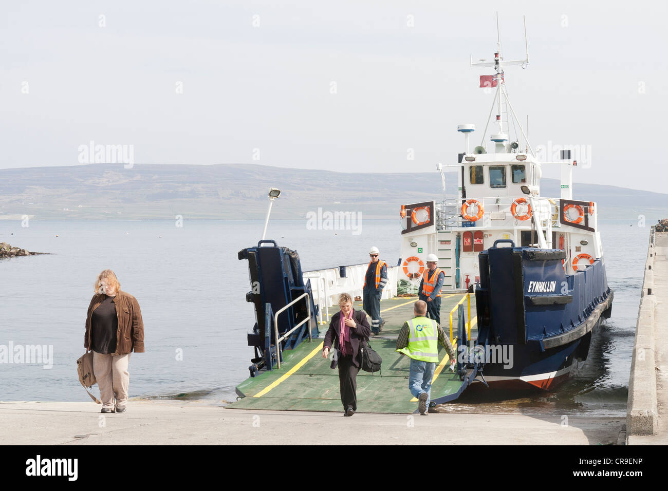 Tingwall Harbour - Orkney Isles, Scotland, foot passengers leaving the ferry Stock Photo