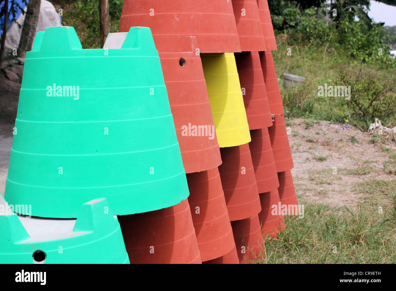 colorful planting pots displayed for sale on roadside in kerala India