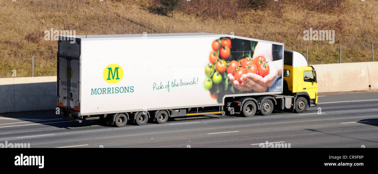 Morrisons supermarket delivery lorry and trailer with advertising graphics for tomatoes Stock Photo