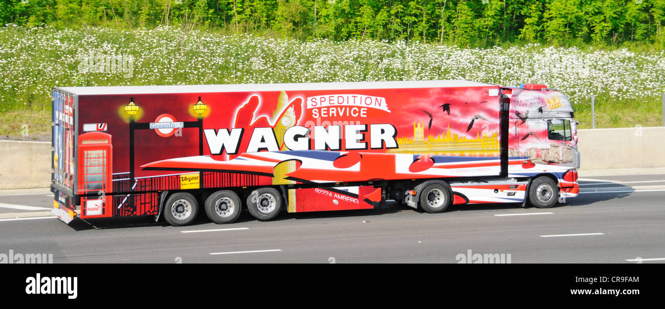 Graphics depicting London tourism scenes on side of Spedition lorry and articulated trailer Stock Photo