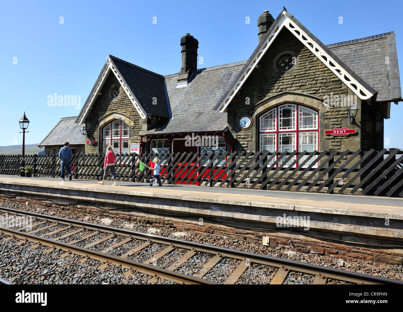 Family waiting for the Carlisle to Settle train, Dent station, Cumbria, England Stock Photo