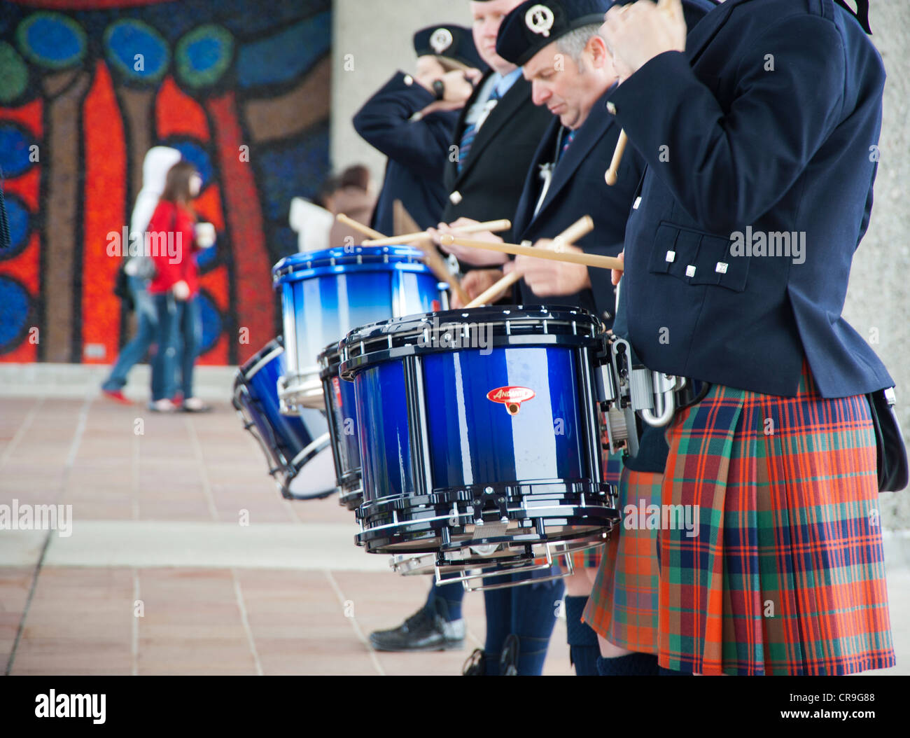 Drummers in a bagpipe band playing, Burnaby, British Columbia, Canada