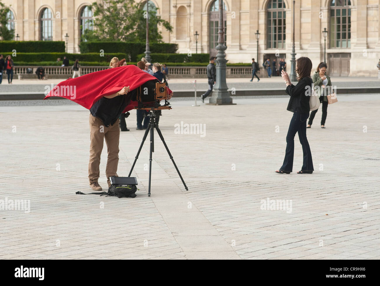 Paris, France - A man using a large format camera outdoors Stock Photo