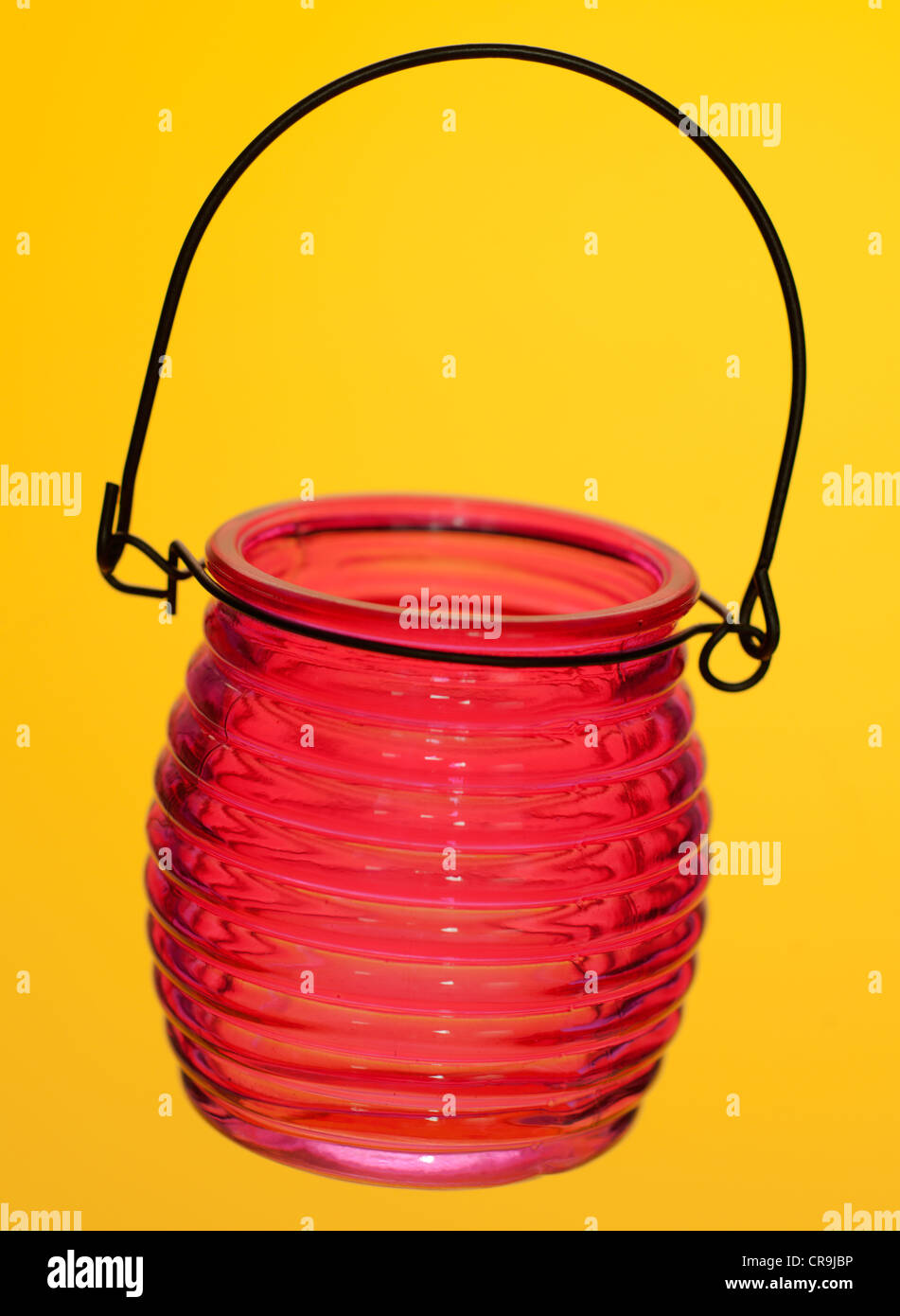 Red glass tealight candle holder Stock Photo Alamy