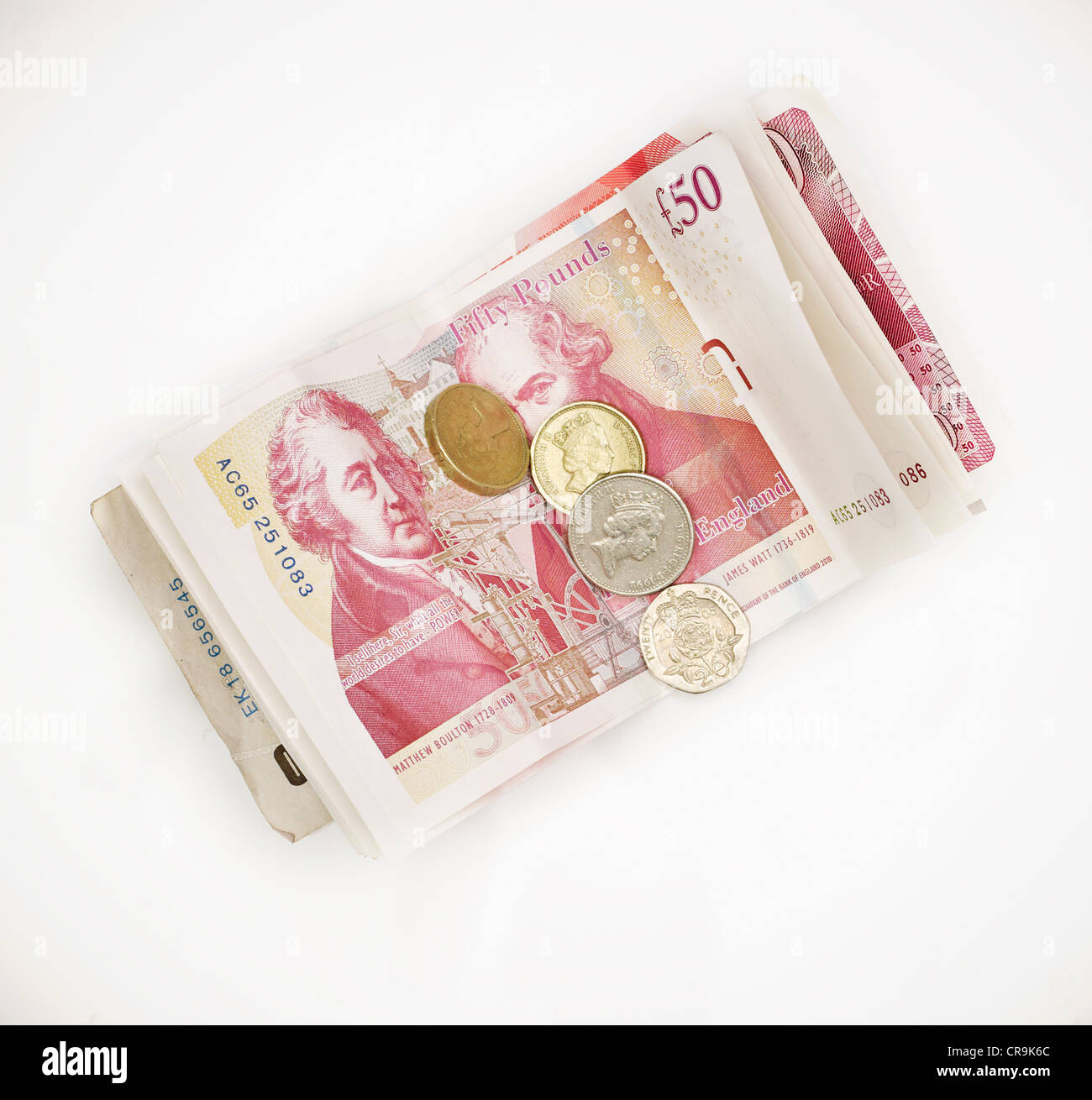 Fifty pound notes and change Stock Photo - Alamy