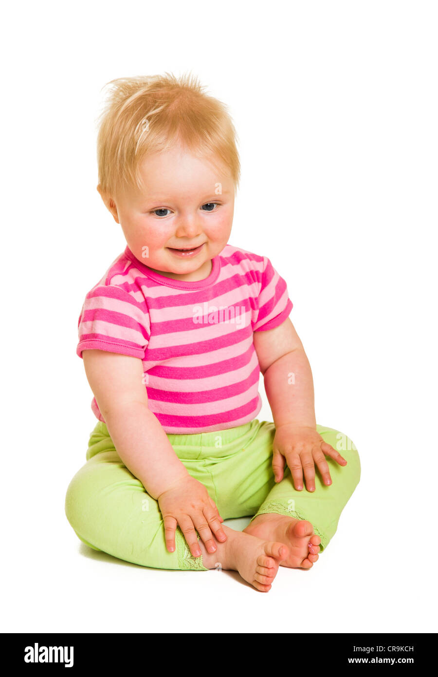 Infant baby girl in studio isolated on white Stock Photo - Alamy