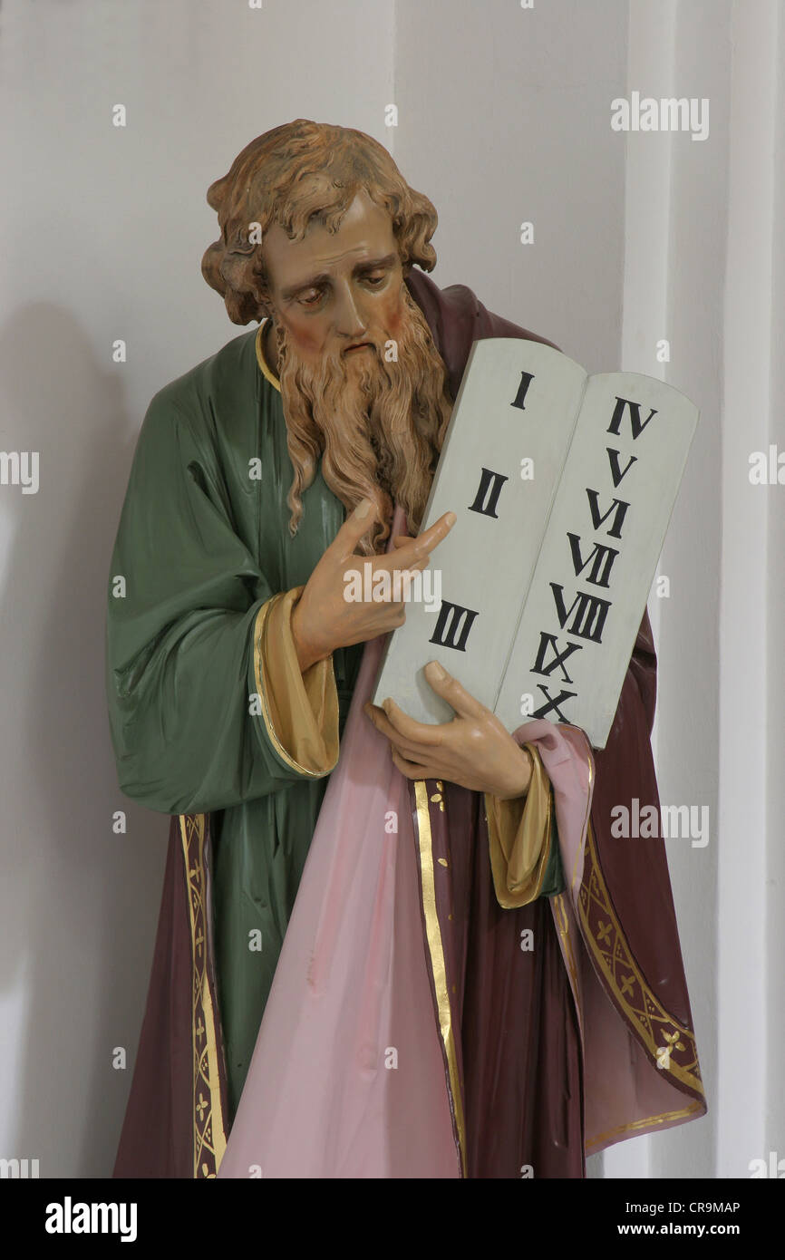 Moses holding the Ten Commandments Stock Photo