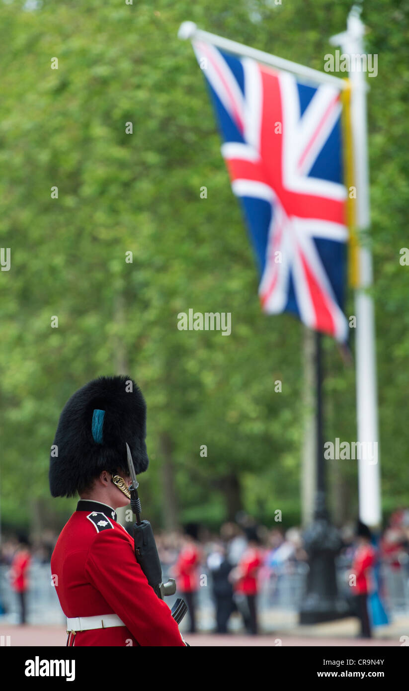 Irish Guardsmen in the Mall for Trooping The Colour to celebrate The Queen's Birthday. The Mall, London, UK. Stock Photo