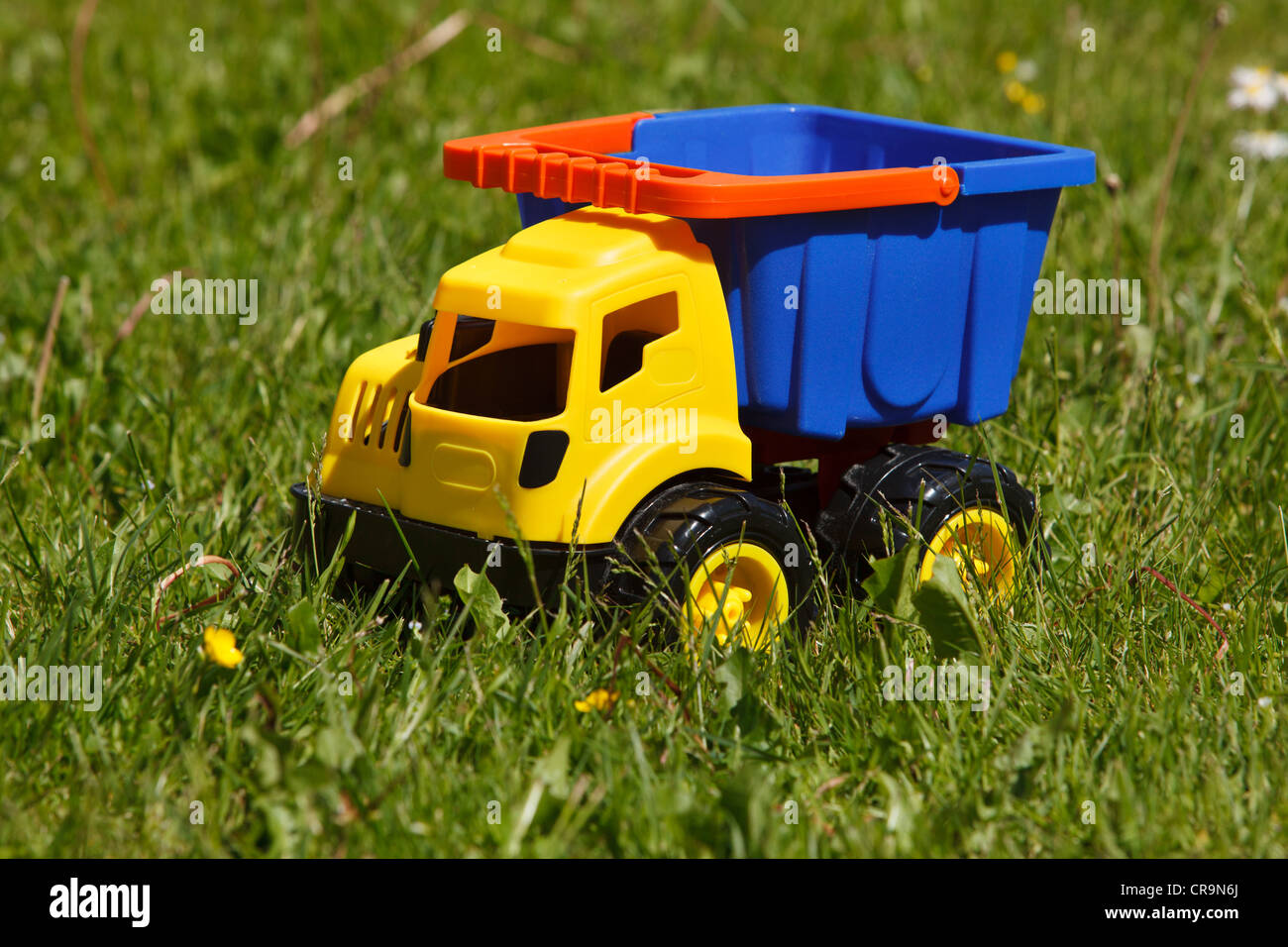 Toy car in sandbox Stock Photo Alamy