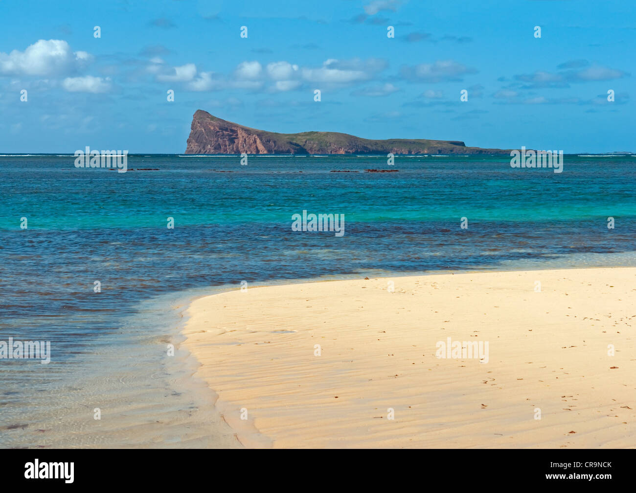 The island of Coin de Mire, off Cap Malheureux on the north coast of the Indian Ocean island of Mauritius Stock Photo
