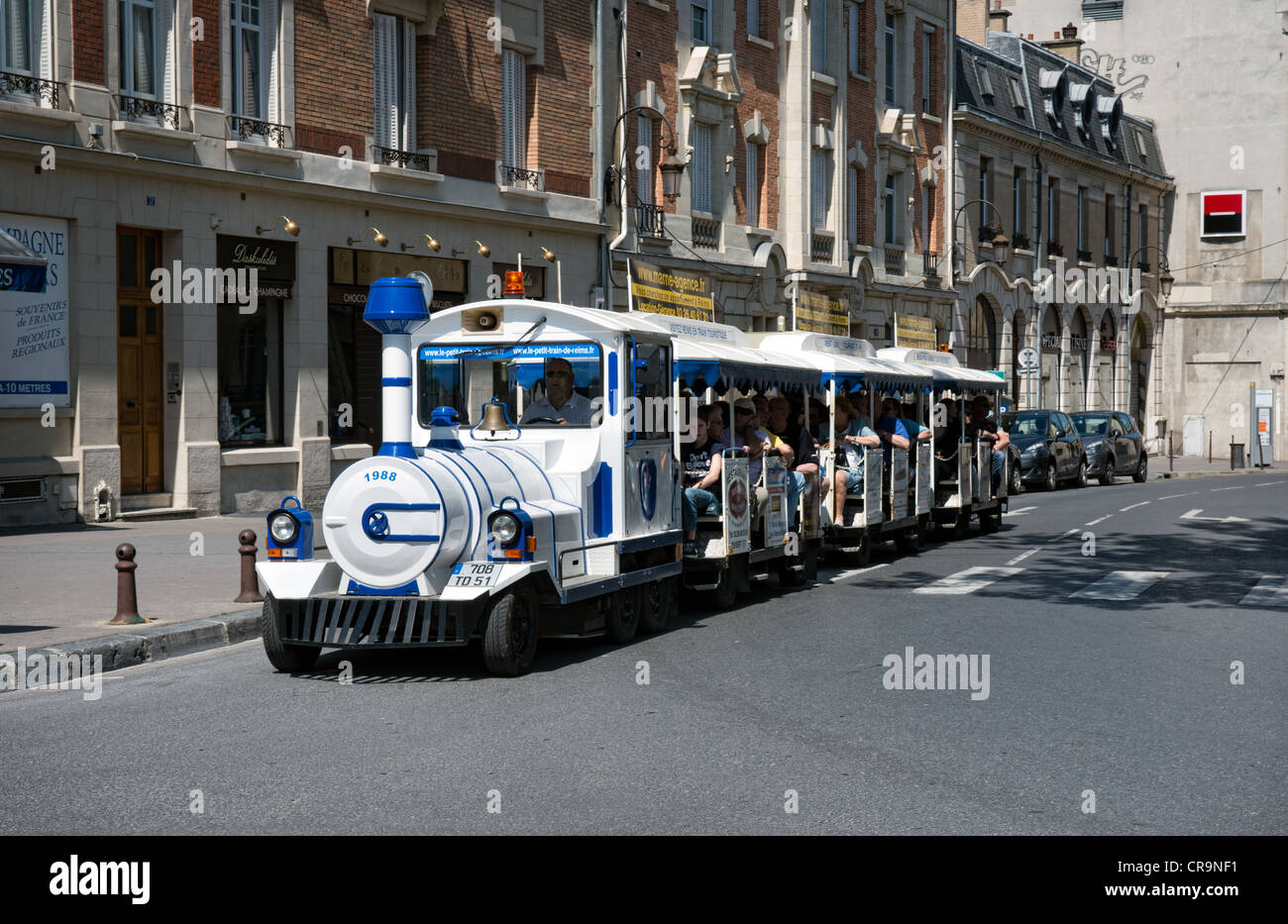 The tourist train that tours central Reims and the cathedral Stock Photo