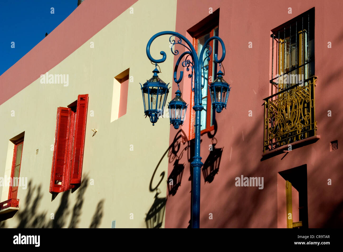 Shadows on the painted walls of the La boca neighborhood of Buenos Aires, Argentina. Stock Photo