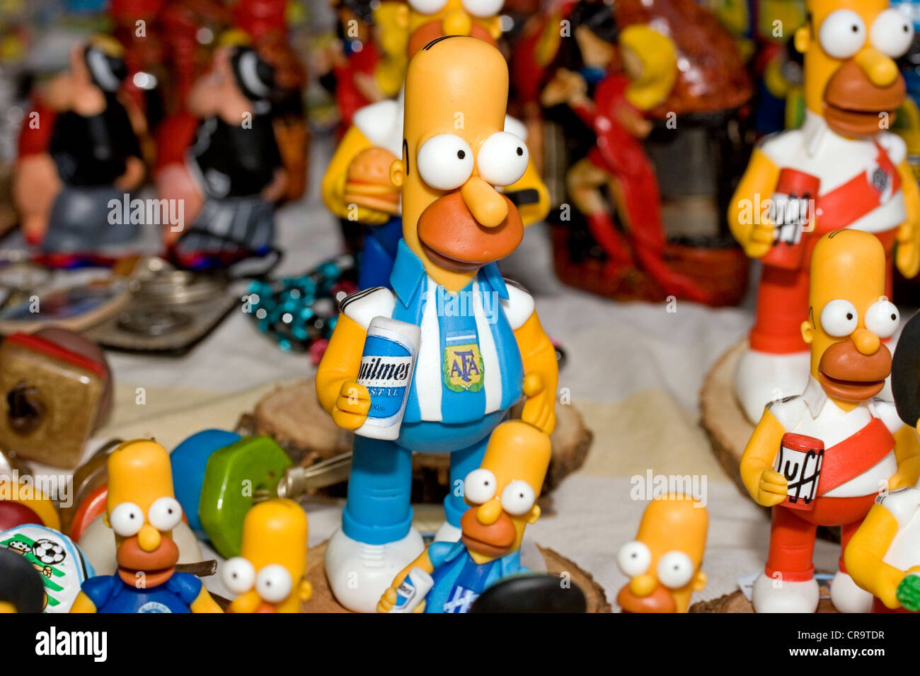 Small models of Homer Simpson wearing Argentina and RIver Plate football strips in the La Boca neighborhood of Buenos Aires. Stock Photo