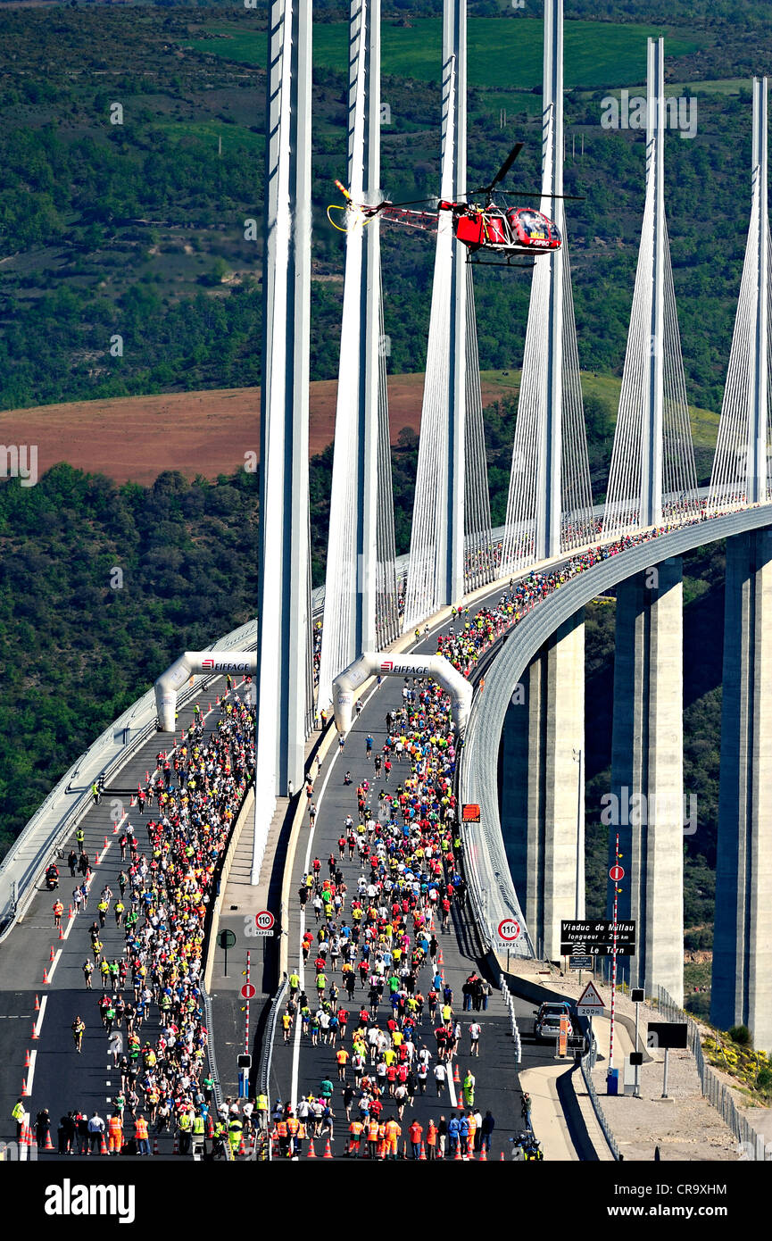Middle distance run over the bridge of Millau; France. Stock Photo