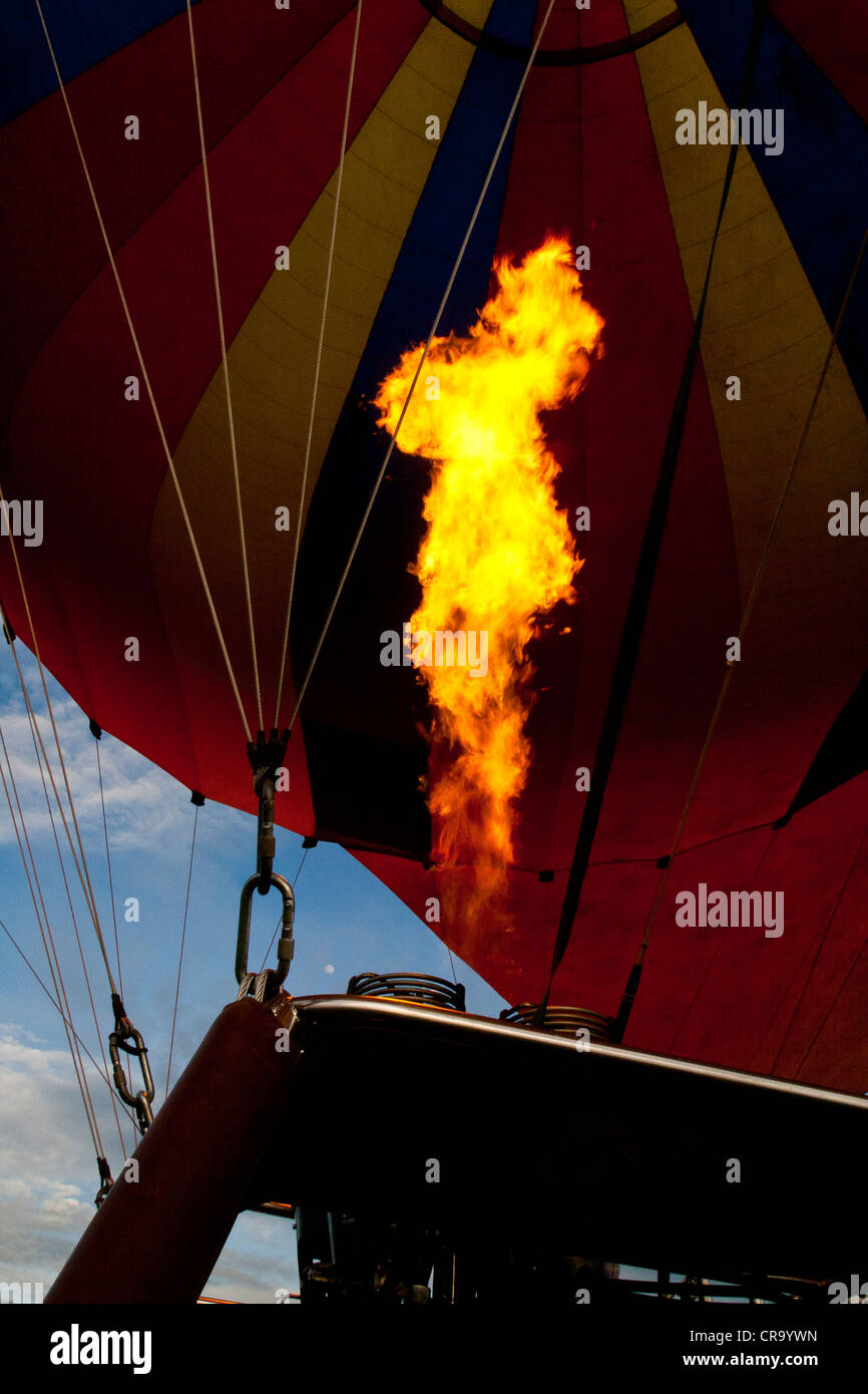 Golden Flame from burners in a hot-air balloon on the Masai Mara National Reserve, Kenya, East Africa. Stock Photo