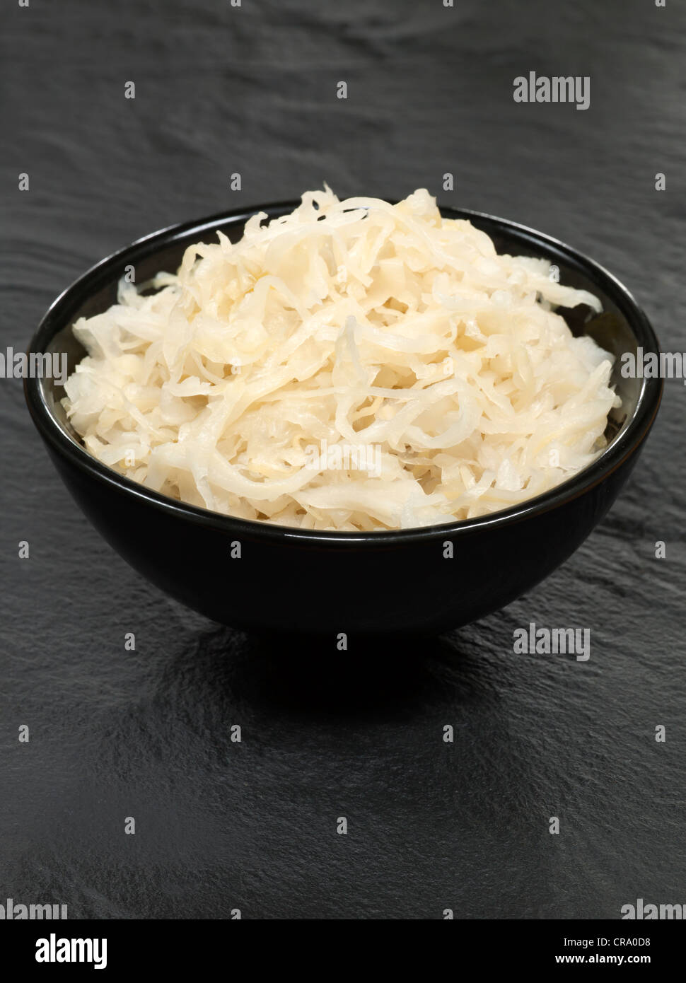 Sauerkraut in Black Bowl Stock Photo